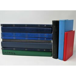 an assortment of 11 used stock books