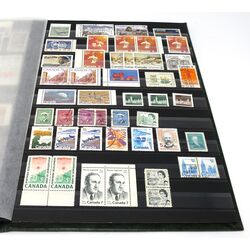 green stockbook including canadian stamps