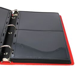 60 used black stock sheets in a red binder