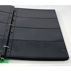 50 used black stock sheets in 2 binders