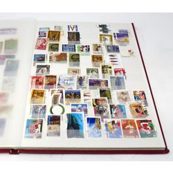 red lighthouse stockbook including used canadian stamps