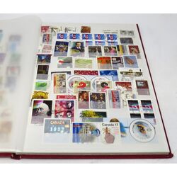 red lighthouse stockbook including used canadian stamps